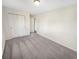 Bedroom featuring neutral walls, plush carpet and a double-door closet at 170 Trails End, Brownsburg, IN 46112