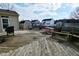 Large backyard with a wooden deck and a red picnic table, perfect for outdoor entertainment at 1905 Windsor Ln, Danville, IN 46122