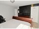 Bedroom featuring a painted wall with a dresser, mirror, and closet at 1905 Windsor Ln, Danville, IN 46122