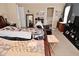 Spacious bedroom showcasing a king bed, and wooden furniture at 1905 Windsor Ln, Danville, IN 46122