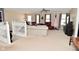 Spacious living room with carpet, ceiling fan and a mix of leather and modern furniture sets at 1905 Windsor Ln, Danville, IN 46122