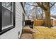 Exterior view of the home features siding, and a wooden fence at 1912 Glenridge Dr, Indianapolis, IN 46218