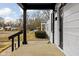 View from the porch with black pillars overlooking the street showing neighborhood at 1912 Glenridge Dr, Indianapolis, IN 46218