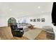 Spacious finished basement features a cozy living area and stylish wet bar for entertaining guests at 19795 Chatham Shore Ln, Westfield, IN 46074
