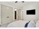 Bright bedroom with a ceiling fan, large closet and an ensuite bathroom at 19795 Chatham Shore Ln, Westfield, IN 46074