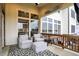 Relax on the covered patio with ample seating and stylish outdoor decor at 19795 Chatham Shore Ln, Westfield, IN 46074