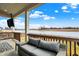 Covered patio with views and comfortable seating at 19795 Chatham Shore Ln, Westfield, IN 46074