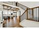 Spacious living room with high ceilings, wooden beams, and large windows offering ample natural light at 19795 Chatham Shore Ln, Westfield, IN 46074