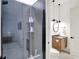 A modern shower room with tile walls, glass doors, and modern fixtures at 19795 Chatham Shore Ln, Westfield, IN 46074