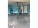 Spacious garage painted with blue walls at 2027 E Werges Ave, Indianapolis, IN 46237