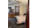 Bedroom featuring a decorative mirror and ceiling fan at 2122 George St, Anderson, IN 46016