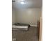 View of the bedroom with a bed, dresser, carpeting, and baseboard at 2122 George St, Anderson, IN 46016