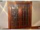 Classic French doors with wooden frames and glass panes at 2122 George St, Anderson, IN 46016