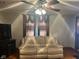 This is a bright living room area with decorative curtains and nice seating at 2122 George St, Anderson, IN 46016