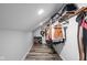 Walk-in closet with wood flooring and built-in shelving at 2224 E Pleasant Run Parkway North Dr, Indianapolis, IN 46203