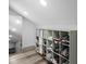 Walk-in closet with a full length mirror and built-in shelving at 2224 E Pleasant Run Parkway North Dr, Indianapolis, IN 46203