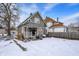 Charming two-story home with a covered front porch and ample yard space at 2401 N Olney St, Indianapolis, IN 46218