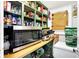 Well-organized pantry featuring extensive shelving, storage containers, and countertop appliances at 2401 N Olney St, Indianapolis, IN 46218