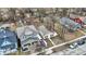 Aerial view of the home in a residential neighborhood, showcasing its proximity to other houses and the street at 2402 Adams St, Indianapolis, IN 46218