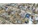 This sky-high view shows houses nestled among the streets and trees, creating a cozy neighborhood feel on an overcast day at 2402 Adams St, Indianapolis, IN 46218