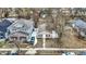 Aerial shot shows the house layout with a compact design and a detached garage in the backyard at 2402 Adams St, Indianapolis, IN 46218