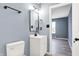Bathroom featuring a modern vanity and a view into the bedroom at 2402 Adams St, Indianapolis, IN 46218