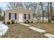 View of the house with a walkway leading to the front door at 2402 Adams St, Indianapolis, IN 46218