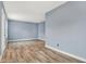 Bright living room with neutral walls and contemporary flooring, awaiting new decor at 2402 Adams St, Indianapolis, IN 46218