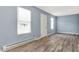 Light-filled living room with freshly painted walls and modern flooring at 2402 Adams St, Indianapolis, IN 46218