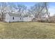 Large backyard with grass and trees at 2420 Sheffield Ave, Anderson, IN 46011