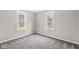 Cozy bedroom with carpet and windows providing natural light at 2420 Sheffield Ave, Anderson, IN 46011