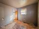 Bedroom featuring hardwood floors, window and a closet with missing door at 3106 N Harding St, Indianapolis, IN 46208