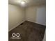 Cozy room featuring carpeting, ideal for a home office or guest bedroom at 3209 Bethel Ave, Indianapolis, IN 46203