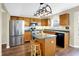 Modern kitchen with stainless steel appliances and a central island at 3367 Redbud Ct, Westfield, IN 46074