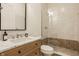 Modern bathroom with marble countertop, sleek vanity, glass-enclosed shower, and neutral color palette at 3588 Marketplace Ct, Zionsville, IN 46077