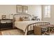 Comfortable bedroom with natural light, decorative lighting, and neutral décor at 3588 Marketplace Ct, Zionsville, IN 46077