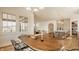 Bright dining room with a wood table, stylish chairs, a view to living room and kitchen at 3588 Marketplace Ct, Zionsville, IN 46077