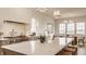 Beautiful kitchen featuring marble countertops, a large island, and stainless steel appliances at 3588 Marketplace Ct, Zionsville, IN 46077