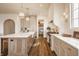 Spacious kitchen features an island, stainless steel appliances, and hardwood floors at 3588 Marketplace Ct, Zionsville, IN 46077