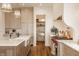 Bright, spacious kitchen with an island, stainless steel appliances, and custom cabinets at 3588 Marketplace Ct, Zionsville, IN 46077