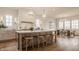 Spacious kitchen with a large center island, pendant lighting, and ample counter space, perfect for gatherings at 3588 Marketplace Ct, Zionsville, IN 46077