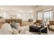 Open-concept living room featuring modern decor and hardwood floors throughout the space at 3588 Marketplace Ct, Zionsville, IN 46077