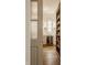 A charming pantry with custom shelving, a beverage fridge, and a window for natural light at 3588 Marketplace Ct, Zionsville, IN 46077