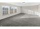 Large bedroom featuring neutral walls, plush carpeting, and plenty of natural light at 4140 Congaree Dr, Indianapolis, IN 46235