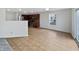 Open kitchen with stainless steel appliances and a dining area at 4140 Congaree Dr, Indianapolis, IN 46235