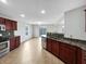 Open kitchen with stainless steel appliances, countertops and adjacent dining area at 4140 Congaree Dr, Indianapolis, IN 46235