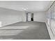 Bright and airy main bedroom with neutral carpet, ample space, and an en-suite bathroom at 4140 Congaree Dr, Indianapolis, IN 46235