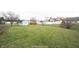 The expansive backyard is enhanced by a storage shed and well-maintained lawn at 436 N Shore Ct, Franklin, IN 46131
