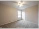 Bright bedroom featuring a ceiling fan, neutral walls, and a window allowing natural light to fill the space at 436 N Shore Ct, Franklin, IN 46131