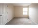 Standard bedroom featuring neutral walls, carpeted floors, and a window at 436 N Shore Ct, Franklin, IN 46131